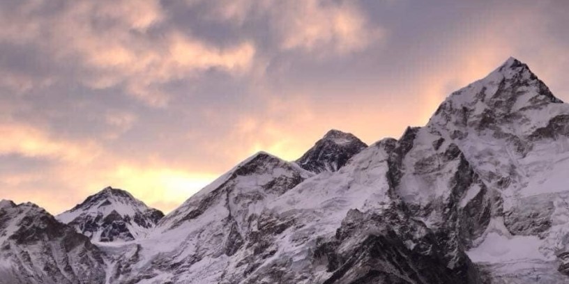 Mountain Peak Under a Bright Red Sky